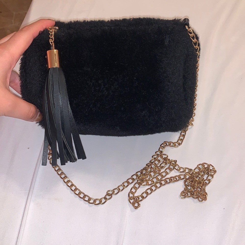 Black furry purse